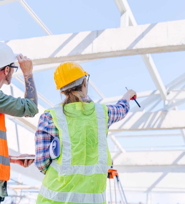 Engineer builder architect team working check roof beam construction progress structure building.